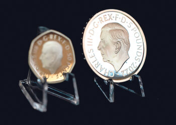 Карл III появился  на монетах